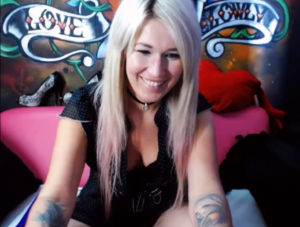 Beautiful blonde woman with tatoos